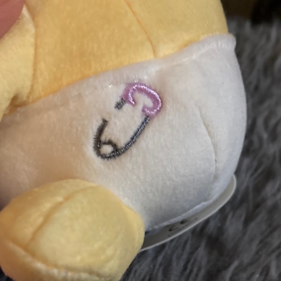 Yellow and Blue Stuffed Animal with Pink Blanket - Picture 8 of 16